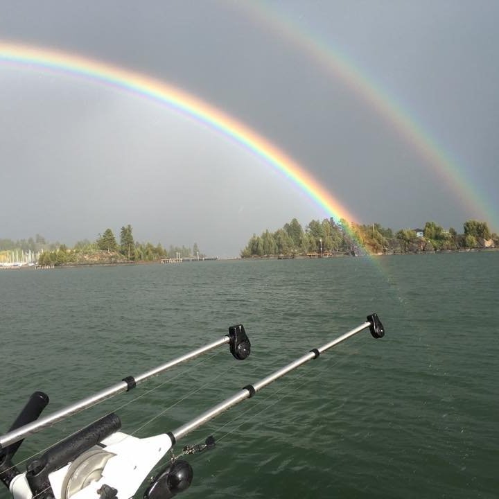 a rainbow over a body of water