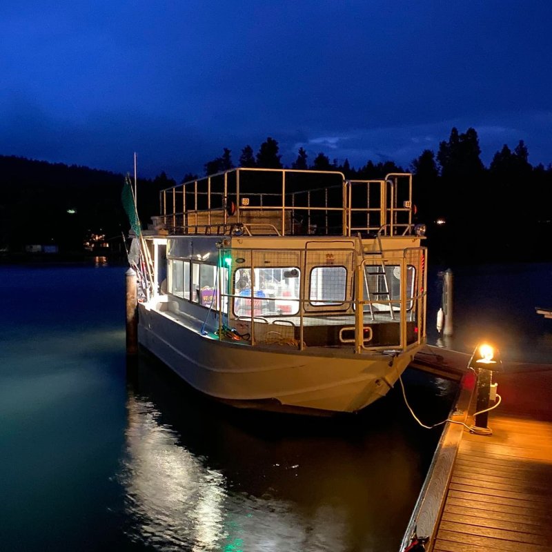 a boat docked at night