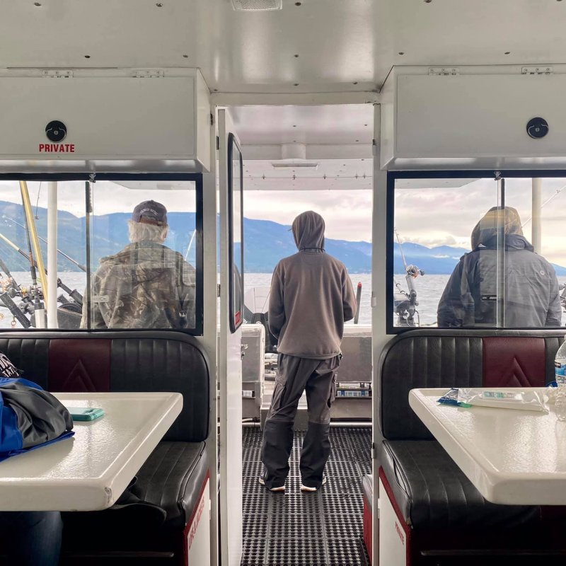 a group of people standing in a room