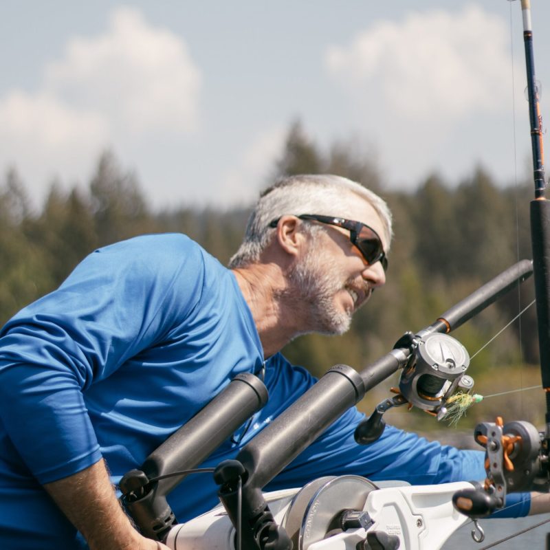 a man in a blue uniform holding a gun