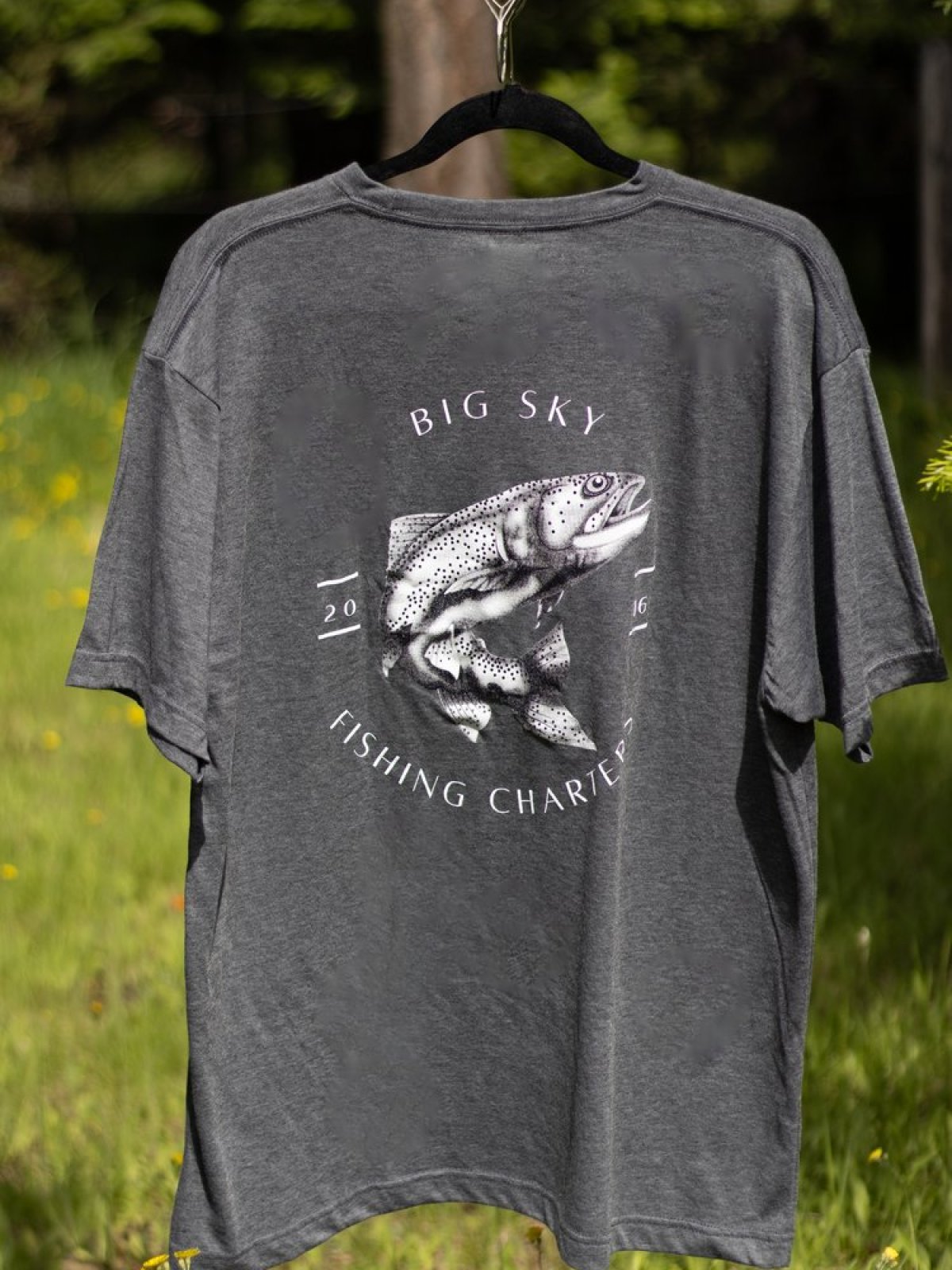 a person standing in the grass