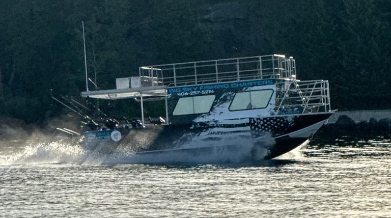 a small boat in a body of water