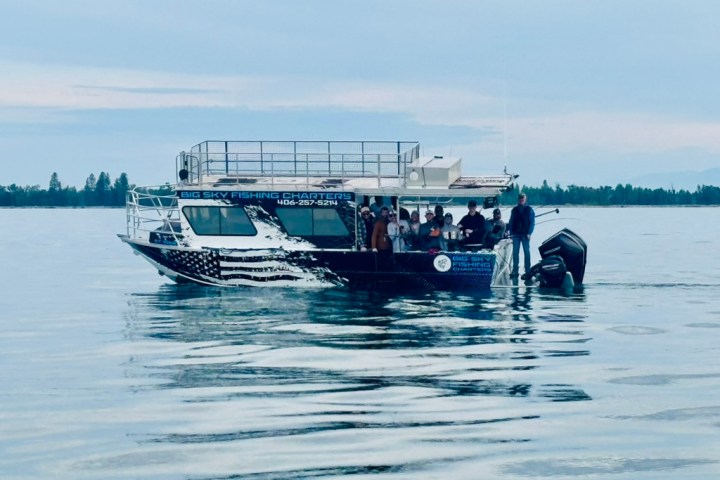 a small boat in a body of water