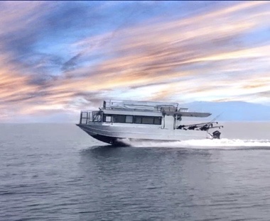 a small boat in a large body of water